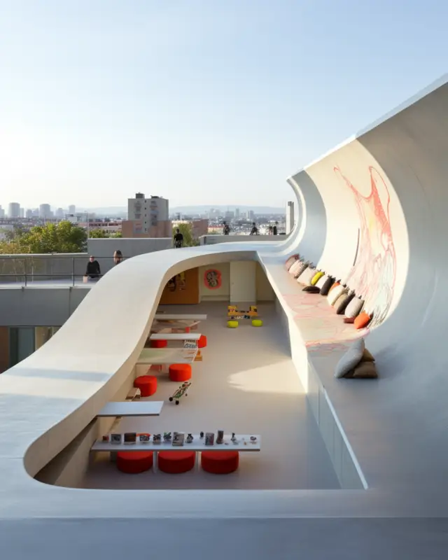 AI-generated open-plan pavilion with concrete skate ramps, modular worktables, and graffiti-covered partition walls, designed by IVA POPSURREAL